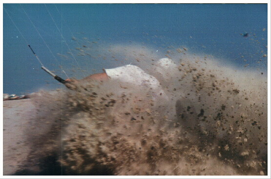Dave Town heaving up the sand.